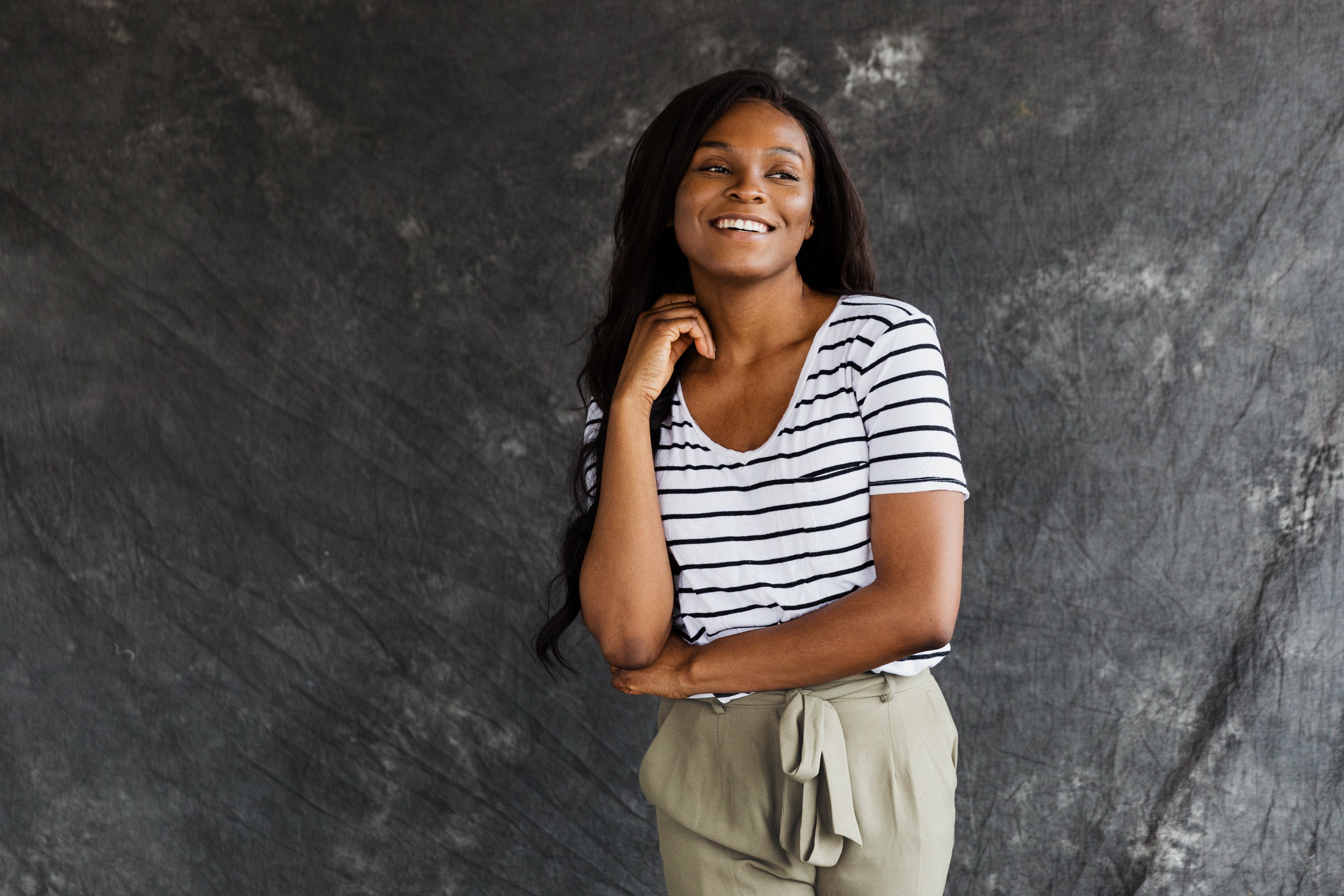 a-model-in-summer-fashion-with-grey-backdrop.jpg